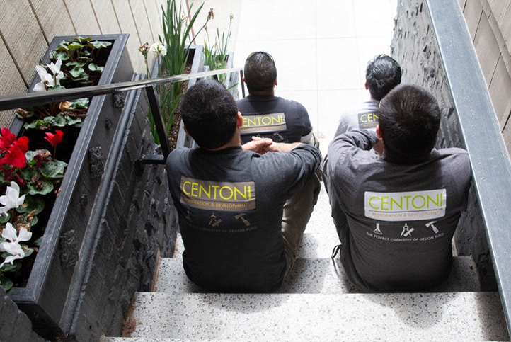 Workers in Centoni T-shirts