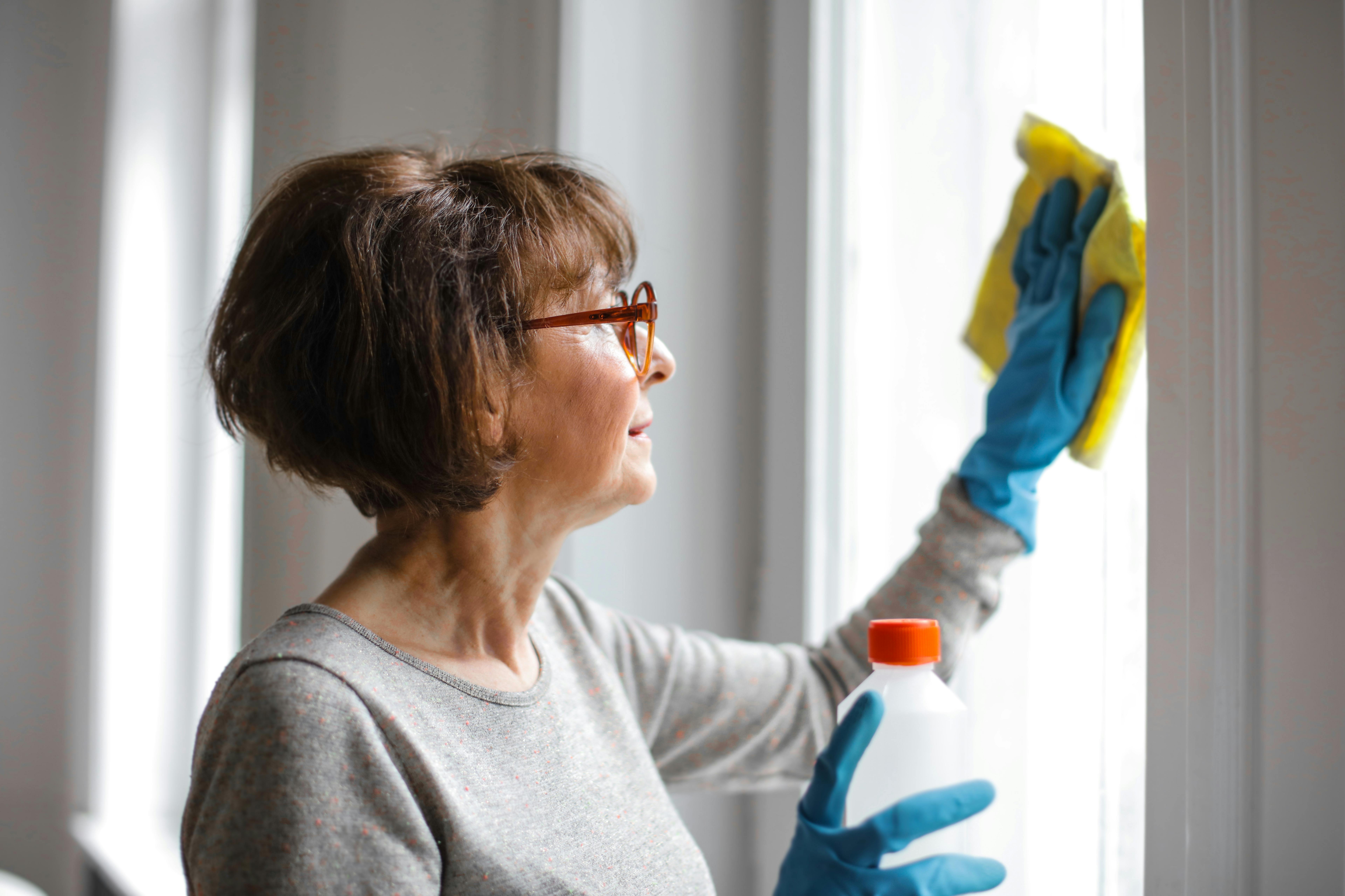 lady cleaning window