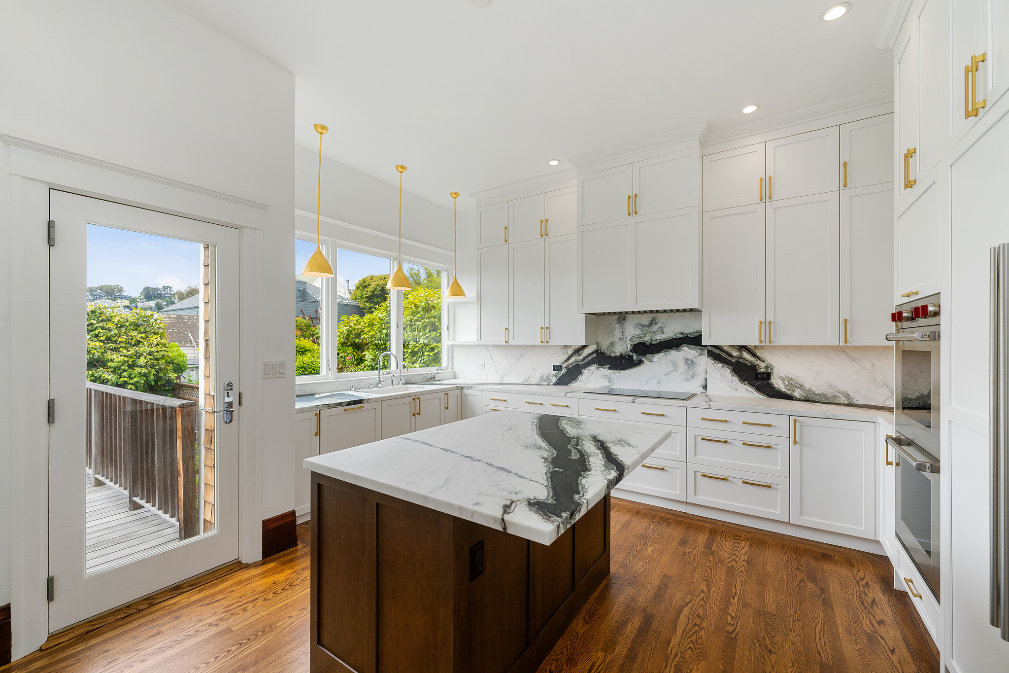 View of a large kitchen with island remodeled by Centoni